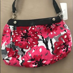 Thirty one interchangeable skirt. The handle is peeling but the skirt is fine.